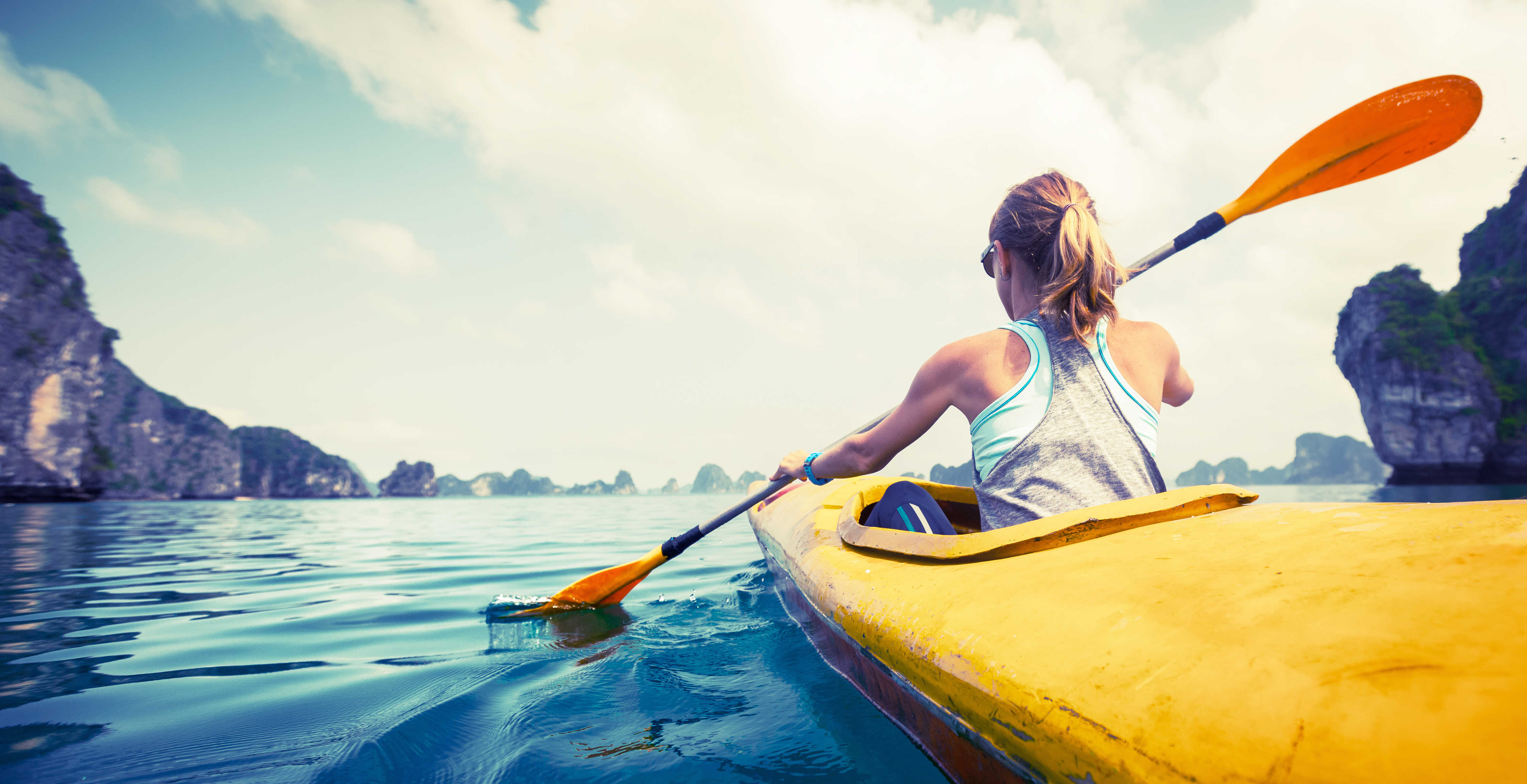 image of woman kayaking